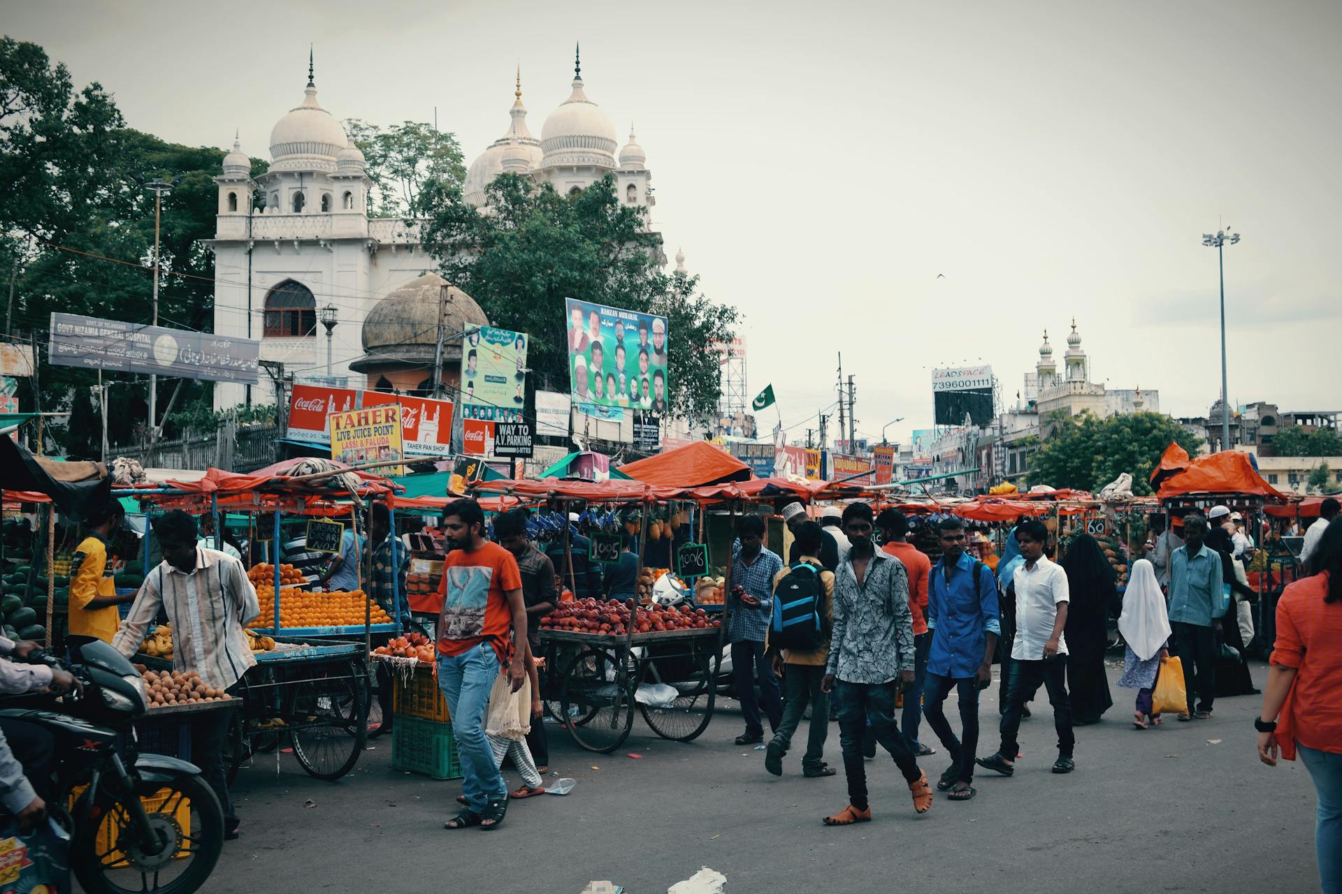 Busy street scene in India with bustling crowds and vibrant activity