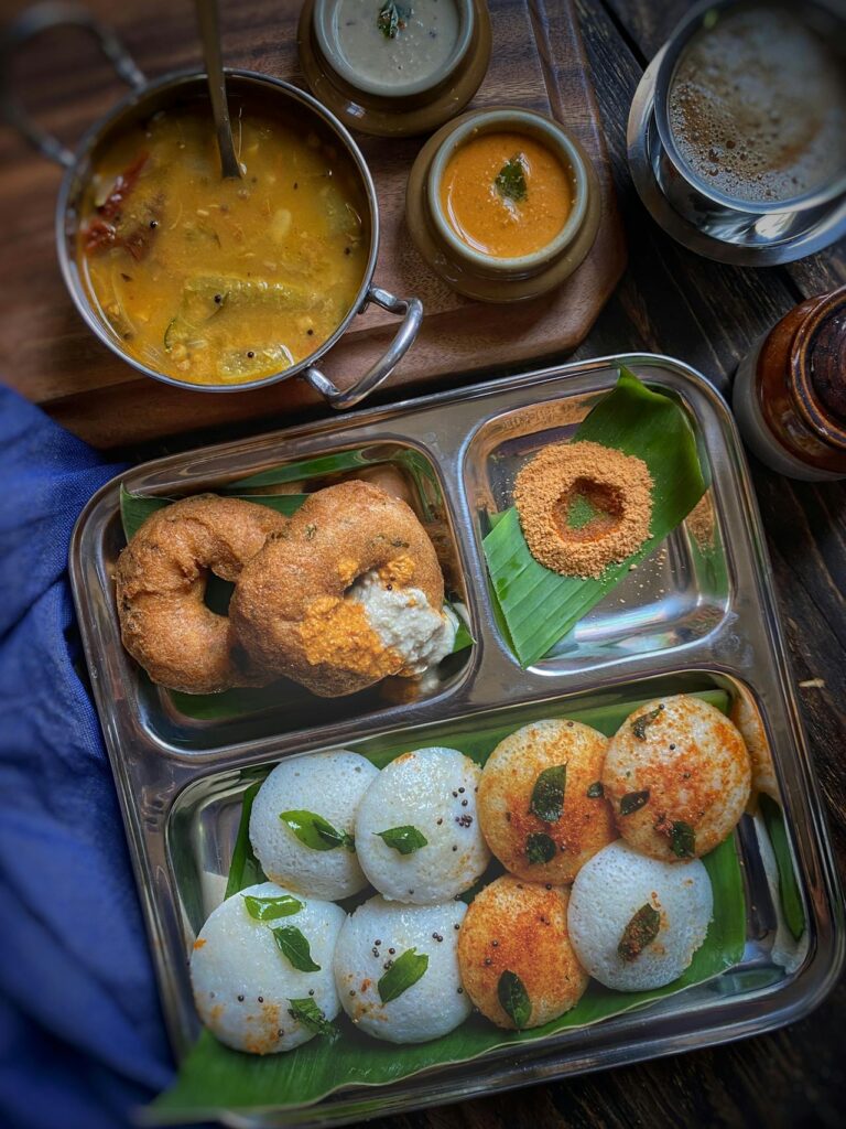 Image of South Indian Cuisine: A delicious spread of dosas, idlis, and sambar, showcasing the flavors of South India