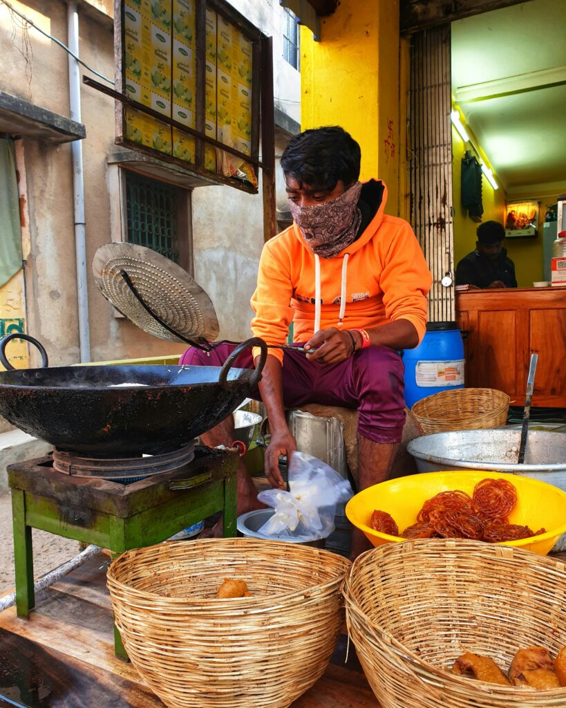 A tantalizing array of Kolkata street food, featuring savory snacks, spicy chaats, and sweet treats, showcasing the vibrant culinary scene of the city.